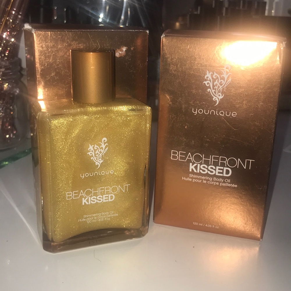Younique. Each front shimmering body oil